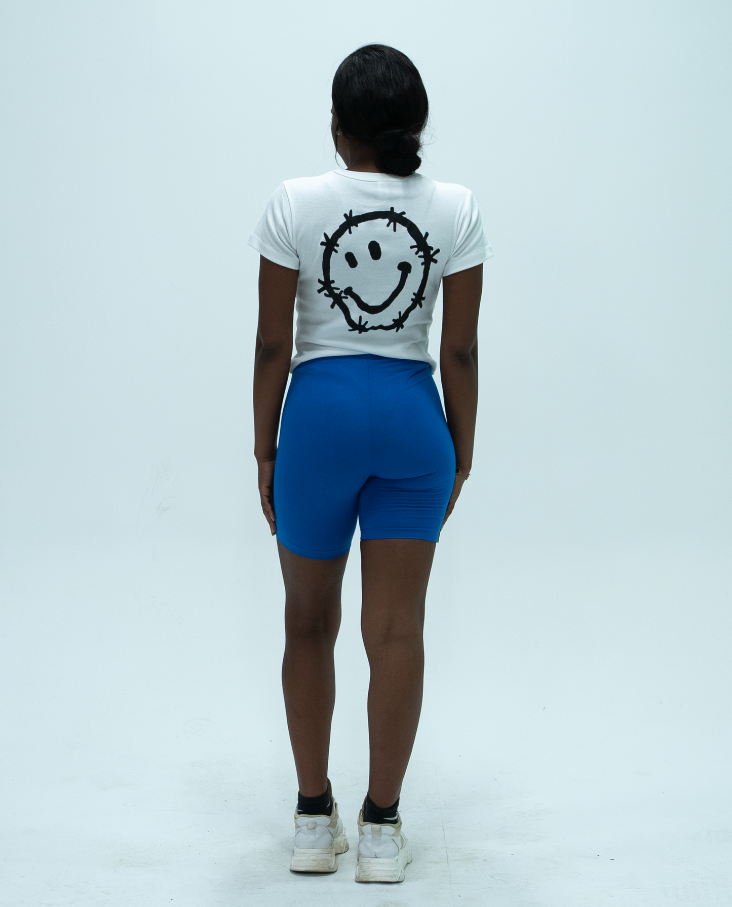 white "logo" baby tee
