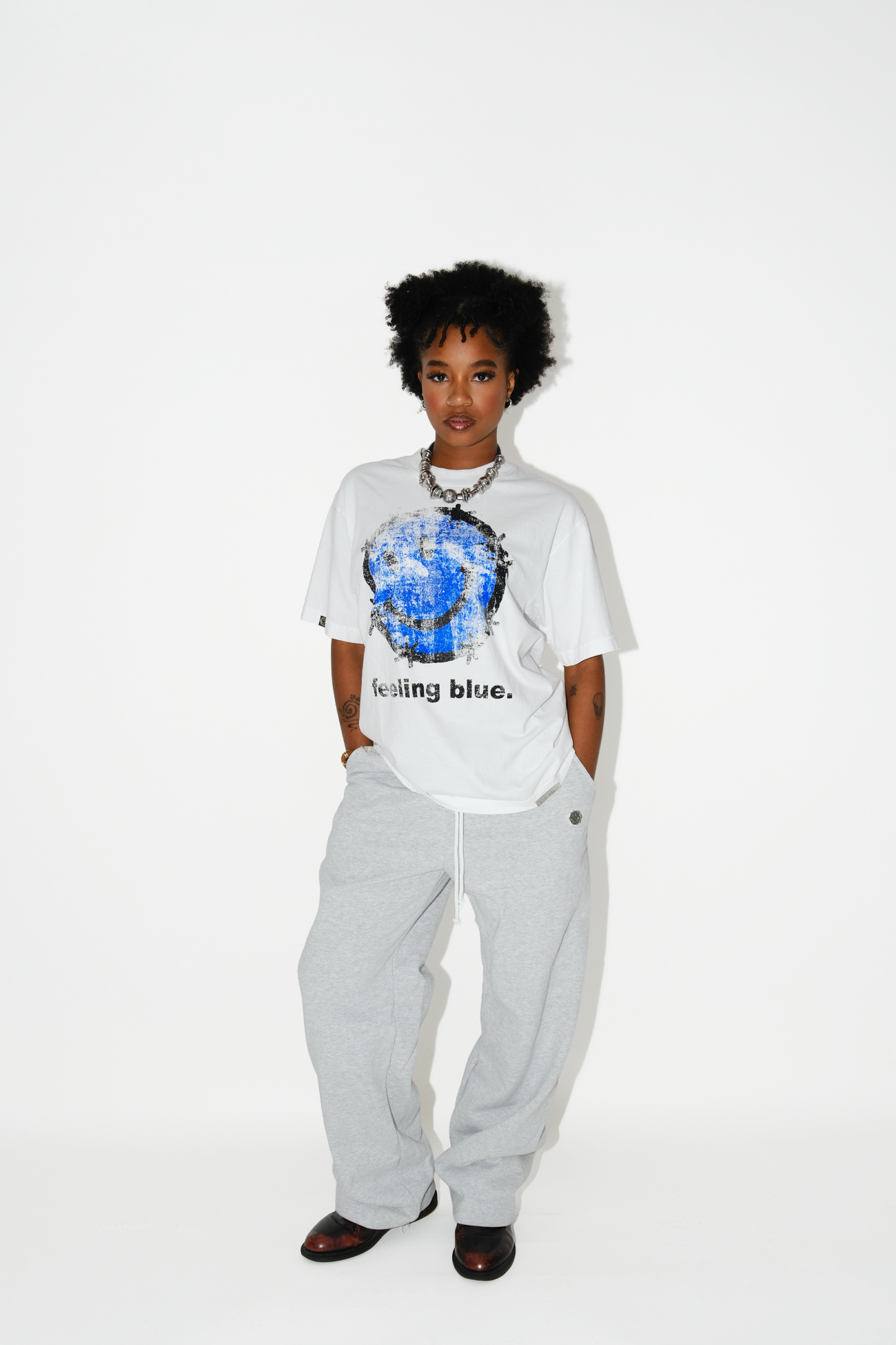 white "feeling blue" tee